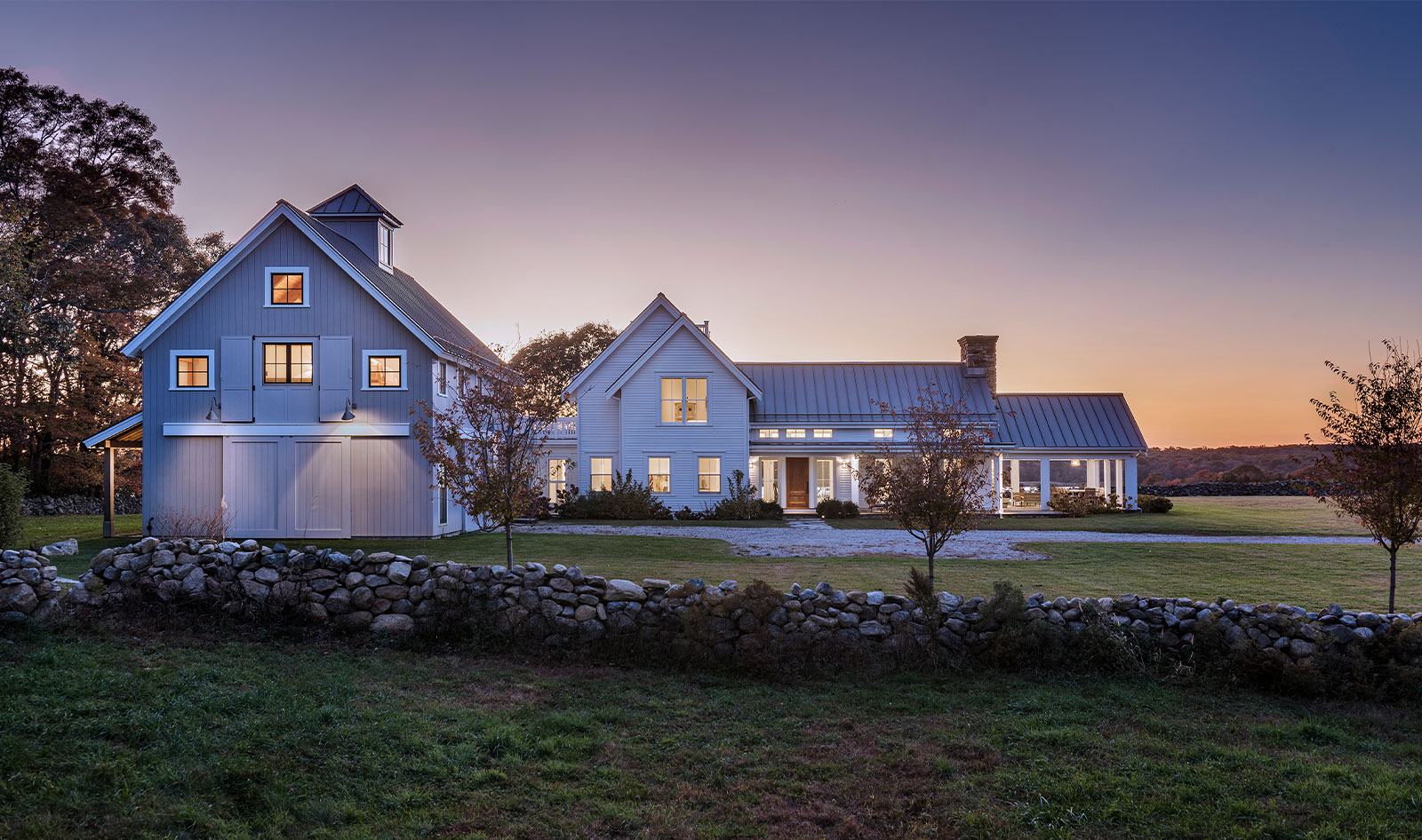 contemporary waterfront farmhouse and barn