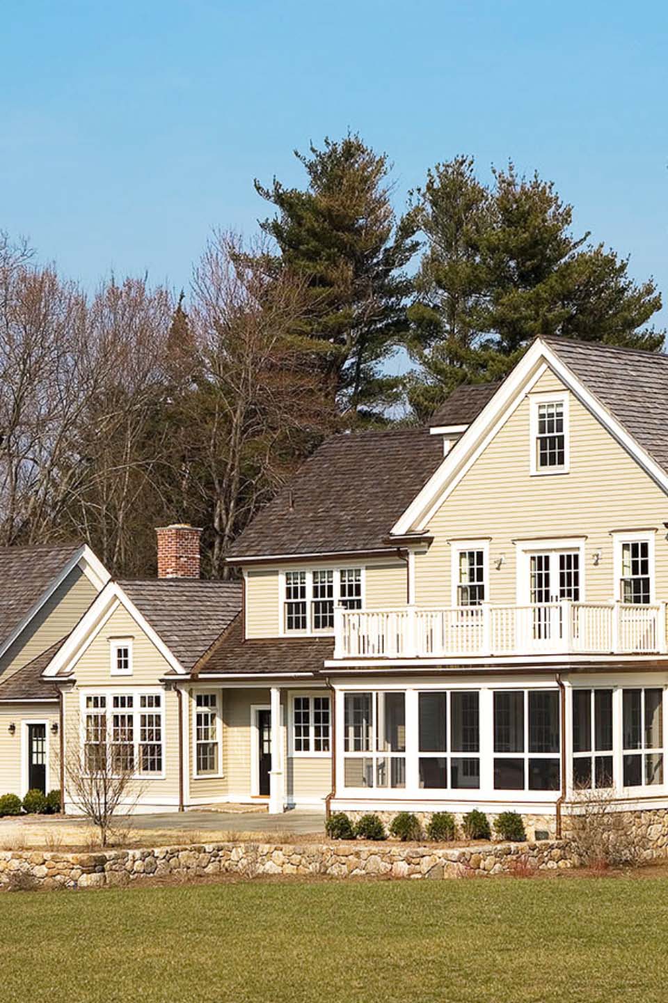dover farmhouse through the trees